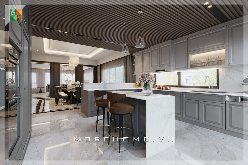 Mẫu tủ bếp bằng gỗ với mặt bàn bếp ốp đá nhân tạo vân mây cao cấp mang đến vẻ đẹp cao cấp phong cách tân cổ điển đẹp cho không gian phòng bếp của bạn